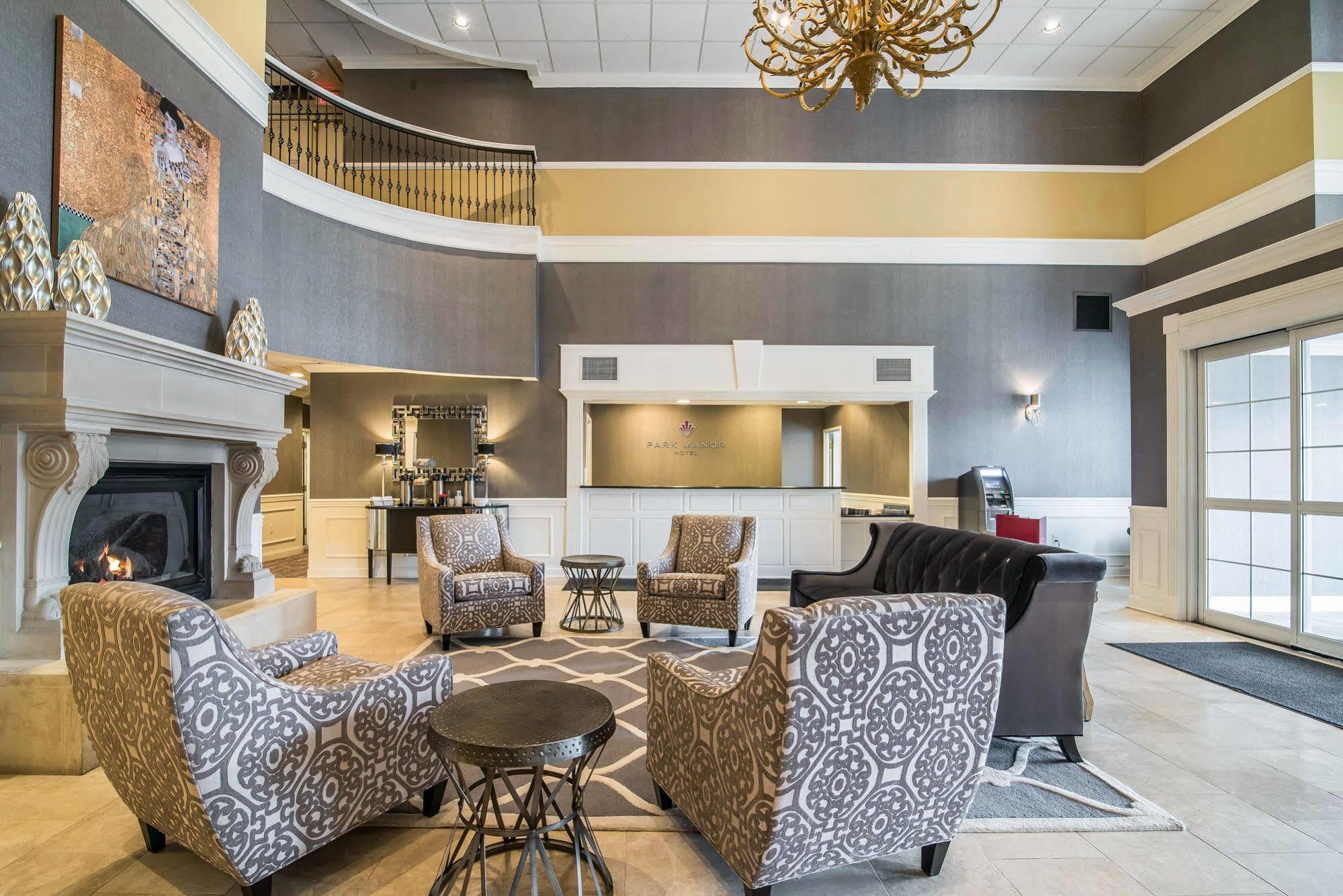 Park Manor Hotel Clifton Park Eksteriør bilde The lobby of the Best Western Premier Executive Residency Royal Palm Beach